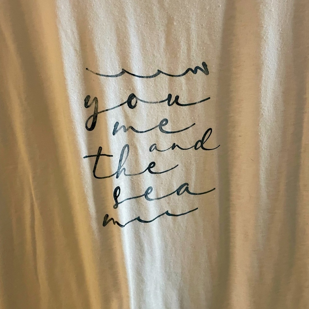 Sperry T-shirt with folded sleeves gently used.